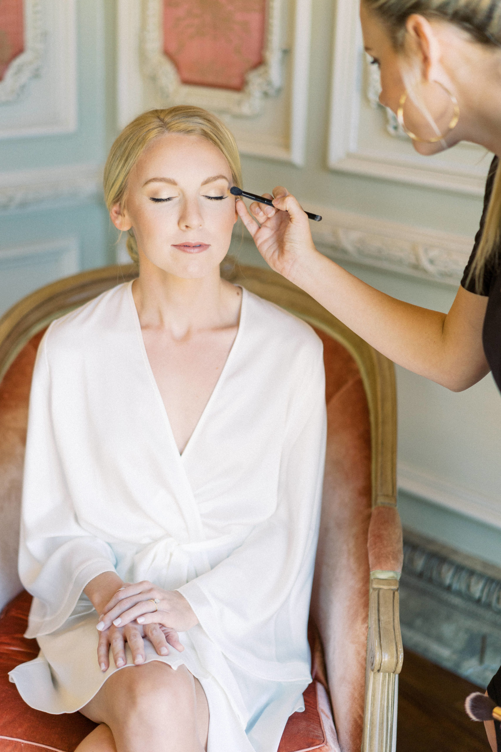 Bride getting her makeup done in one of the suites in The Olana